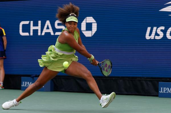 Naomi Osaka (JPN) reaches for a backhand against Jelena Ostapenko (LAT)(not pictured) in a women's singles match on day two of the 2024 U.S. Open tennis tournament at USTA Billie Jean King Natio<em></em>nal Tennis Center.