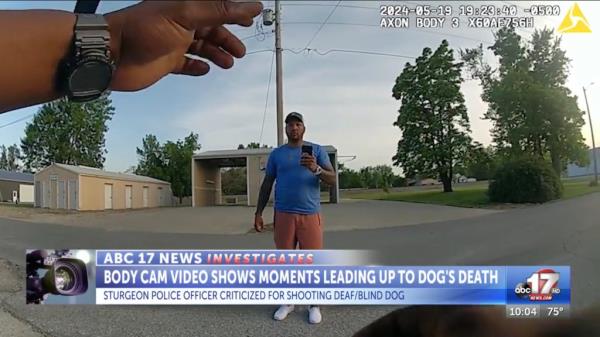 Hunter talks to the officer.
