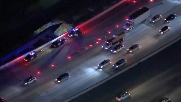Police at the scene of the highway.