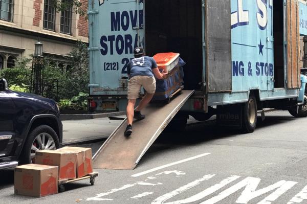 A mover puts belo<em></em>ngings into a moving truck following the outbreak of the coro<em></em>navirus disease (COVID-19) in the Manhattan borough of New York City, New York, U.S., September 1, 2020