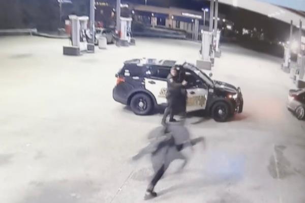 The thieves were able to hop into the getaway car before the officer could stop them. 