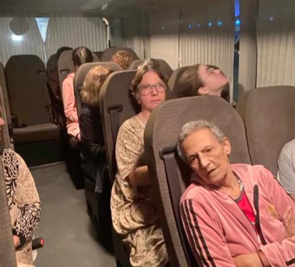 Tamar Metzger, 78, is in the front row of the bus that was being transported out of Gaza.