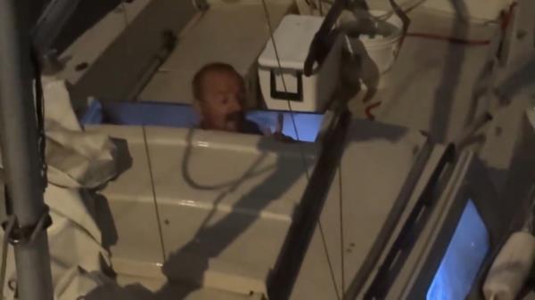 Lieutenant Dan emerges from his boat after surviving Hurricane Milton on Oct. 9, 2024.