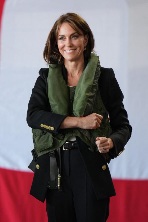 Middleton, who was also seen chatting with several Navy members, was then given a life vest and reportedly asked to demo<em></em>nstrate how to deploy the life-saving device in front of the survival equipment technicians. 
