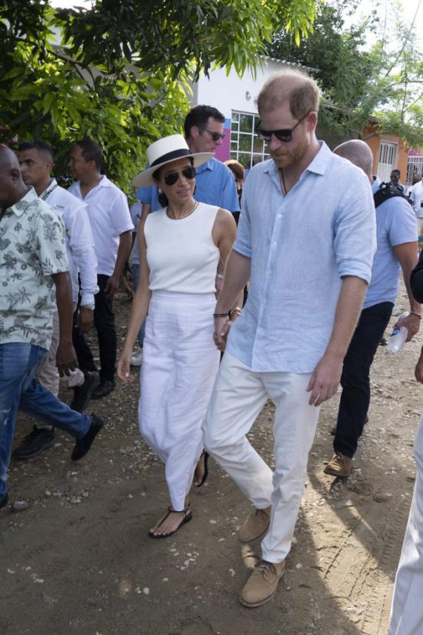 Prince Harry and Duchess Meghan of Sussex exploring San Basilio de Palenque in Colombia