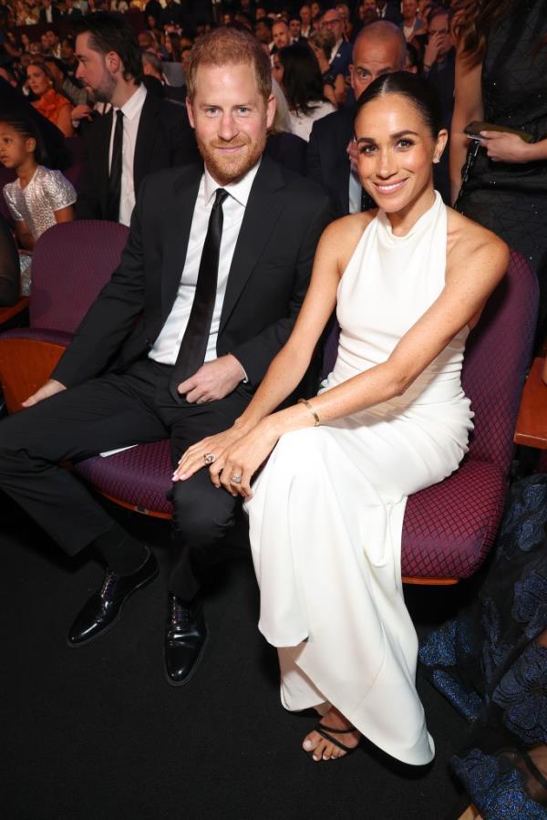 Prince Harry and Meghan, Duchess of Sussex, among other celebrities, sitting in chairs at the 2024 ESPY Awards in Hollywood, California.