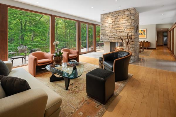 The home includes clean lines, natural elements and large exposures -- all hallmarks of midcentury-modern design.
