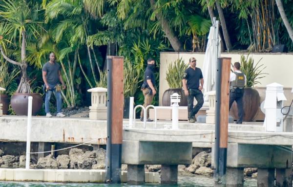 Feds at his Miami home. 