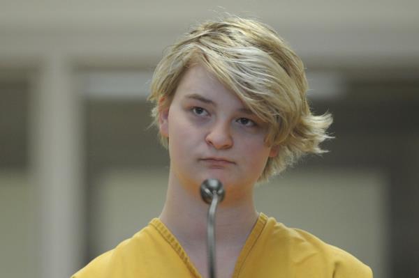 In this Sunday, June 9, 2019 photo, Denali Brehmer, 18, stands at her arraignment in the Anchorage Correctio<em></em>nal Center in Anchorage, Alaska