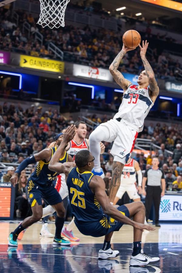 Wizards forward Kyle Kuzma (33) shoots against the Pacers on Oct. 25, 2023.