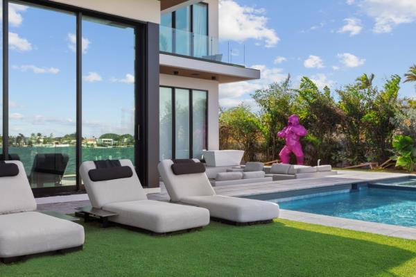 This stunning  modern residence, which comes with its own dock, sold for $11 million.
