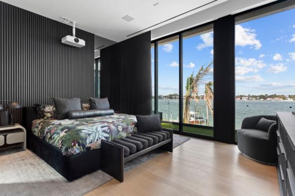 The home's main bedroom comes with serene views