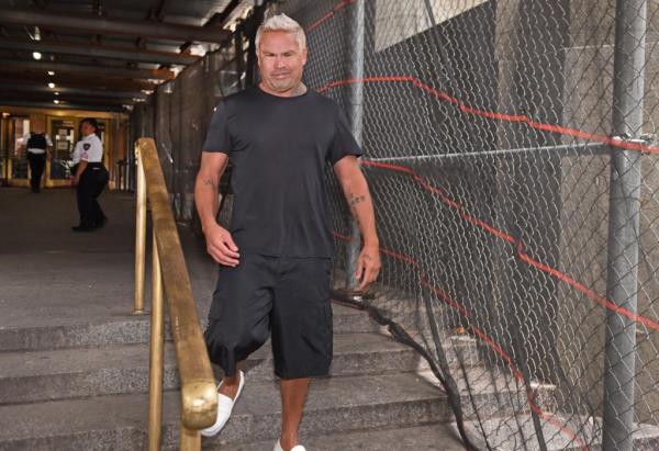 Fashion designer Bobby Vaughn, 48, left the courthouse alone after his arraignment for assault on Mo<em></em>nday afternoon