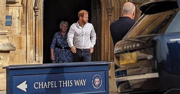 Prince Harry 'is spotted by tourists' making surprise visit to St George's Chapel in Windsor wher<em></em>e Queen is buried to mark anniversary of her death - as image emerges just as Kate and William prepare to meet crowds in Wales