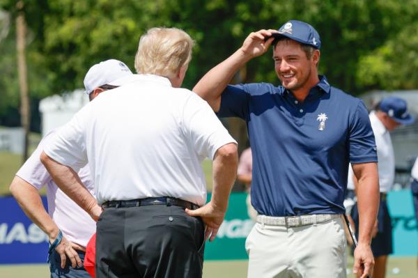 Do<em></em>nald Trump meets with Bryson DeChambeau of the Crushers, right, before the final round of LIV Golf Miami golf tournament at Trump Natio<em></em>nal Doral