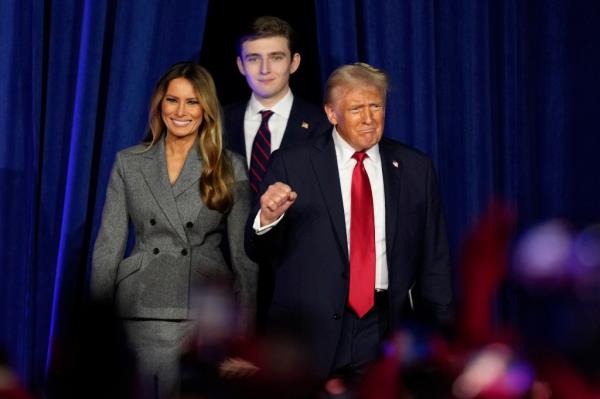 Do<em></em>nald Trump, Melania Trump and Barron Trump arrive at the victory party in Nov. 6, 2024.