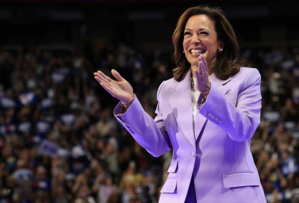 U.S. Vice President Kamala Harris, in a purple suit, attending a campaign event at University of Nevada, Las Vegas campus on August 10, 2024.