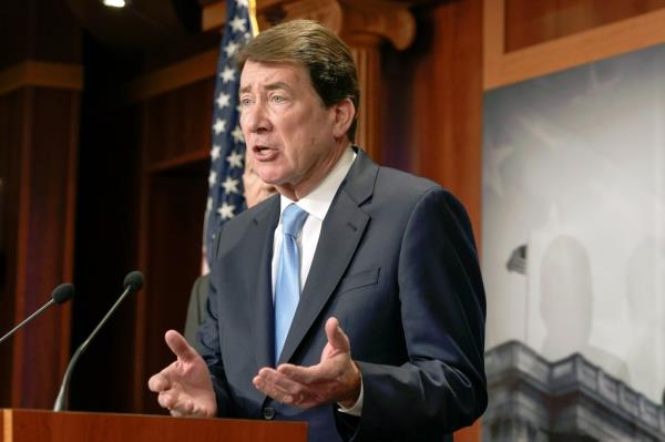 Sen. Bill Hagerty, R-Tenn., talks during a press co<em></em>nference on illegal immigration and the census, at the Capitol in Washington.