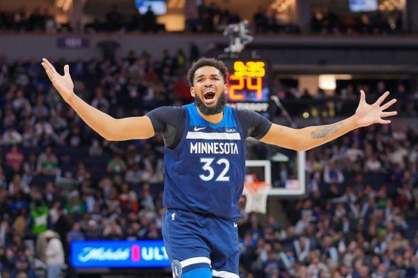 Timberwolves center Karl-Anthony Towns (32) complains a<em></em>bout a call against the Portland Trail Blazers in the third quarter at Target Center. 