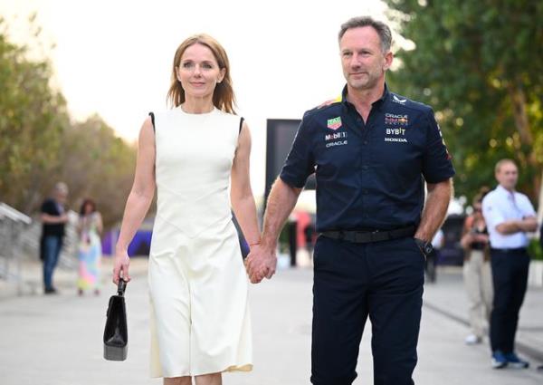 BAHRAIN, BAHRAIN - MARCH 02: Oracle Red Bull Racing Team Principal Christian Horner and Geri Horner walk in the Paddock holding hands prior to the F1 Grand Prix of Bahrain at Bahrain Internatio<em></em>nal Circuit on March 02, 2024 in Bahrain, Bahrain. (Photo by Clive Mason/Getty Images)