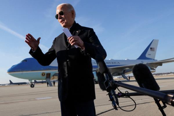President Joe Biden speaks to media before departing from the Milwaukee Mitchell Internatio<em></em>nal Airport, Wisconsin, U.S., December 20, 2023. 