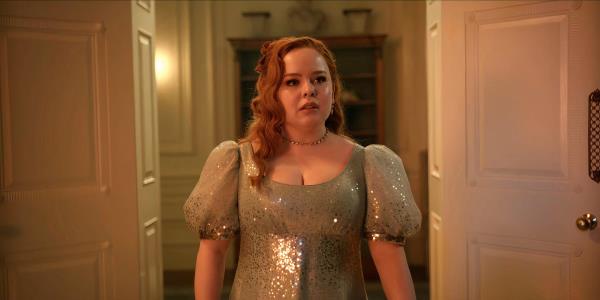 Nicola Coughlan as Penelope Featherington Walking Through a Doorway in Bridgerton season 3