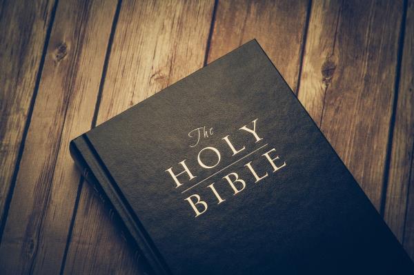 Owens is accused of hitting the manager with he Bible after both of them got into an argument.