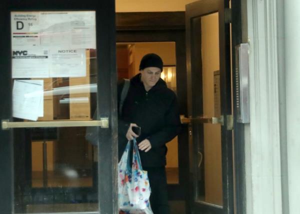 Michael Stuhlbarg was seen walking out of his apartment building after the attack.