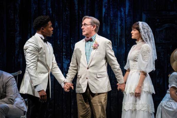 Ephraim Sykes, Richard Thomas and Zoey Deutch in a wedding