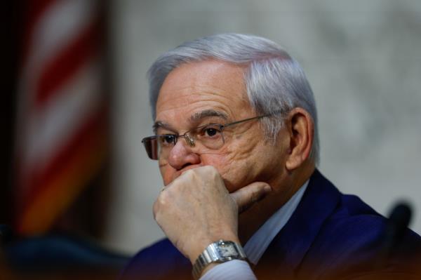 Menedez (D-NJ) looks on during the U.S. Senate Banking, Housing and Urban Affairs Committee oversight hearing.