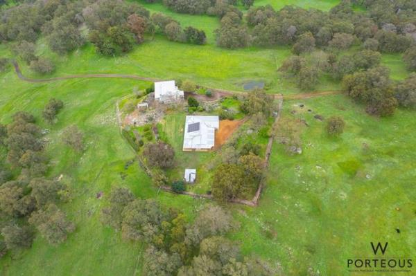 Nestled high on the hills overlooking the rolling farmland, the property includes two eco-friendly homes on 42ha, a<em></em>bout 23km from Bunbury.