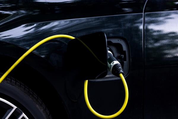 Charger plugged into an electric vehicle