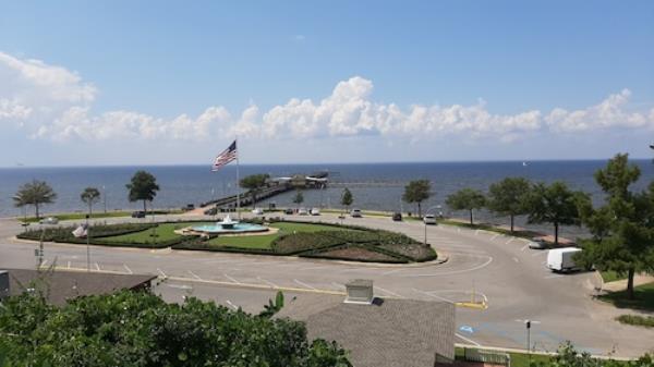 Fairhope's municipal pier, and the adjoining park, have long been known as good places to watch the sun set across Mobile Bay.