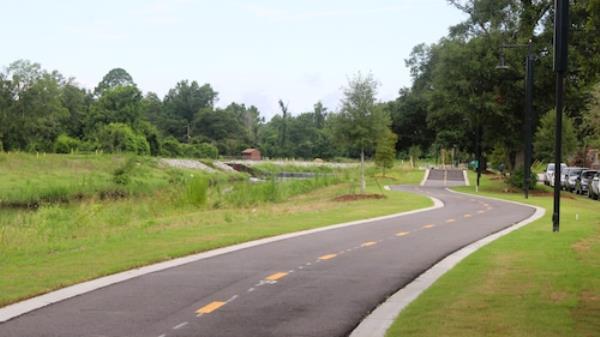Mobile officials held a ribbon-cutting for the second section of the city's Three Mile Creek Greenway on June 27, 2024.