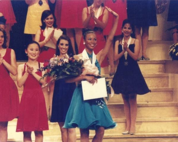 Tyrenda Williams waves to the crowd after being announced as America's Junior Miss in June 1997. (Courtesy of Distinguished Young Women)
