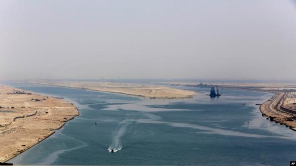FILE - The entrance of the new section of the Suez Canal in Ismailia, Egypt, on Aug. 6, 2015. 
