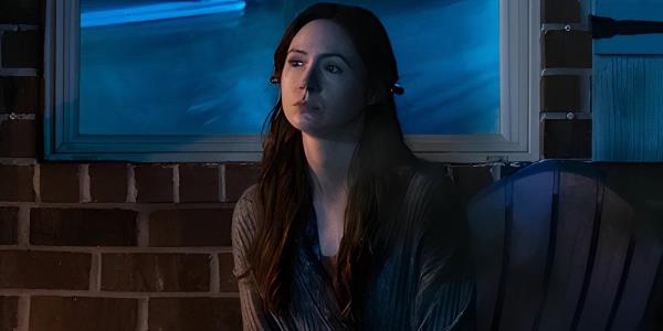 Karen Gillan Sitting in Front of a Glowing Window in The Life of Chuck