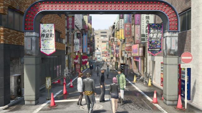 Kiryu walks into Kamurocho with Zhao, Nanba, Saeko, and Seo<em></em>nhee in Like A Dragon:Infinite Wealth