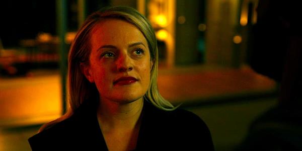 Elisabeth Moss looks upward mysteriously in The Invisible Man