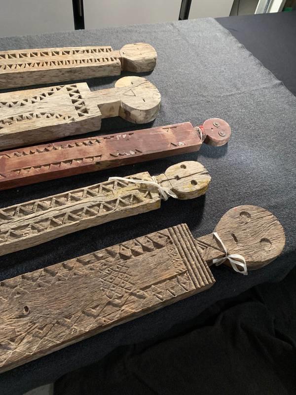 Vigango are prepared for their journey back to Kenya in June 2022 at the Illinois State Museum Research and Collections Center in Springfield. The sacred wooden memorial statues were returned as part of a co<em></em>ntinuing effort to repatriate these looted cultural artifacts. 