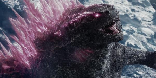 A close-up of Godzilla in Godzilla x Kong: The New Empire with glowing pink fins and eyes.