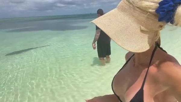The Undertaker and his wife stood near a shark