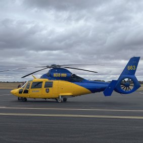 The DFES helicopter landing at Kalgoorlie airport this afternoon.