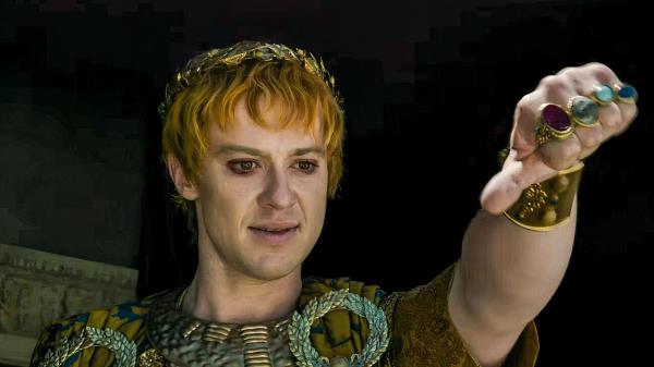 Joseph Quinn holding his thumb to the side in Gladiator 2 