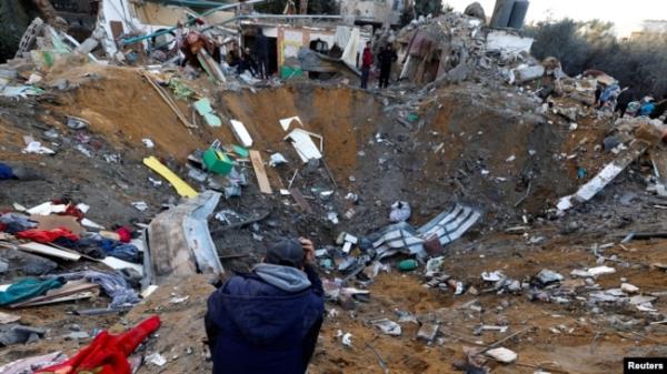 A Palestinian looks on at the site of Israeli strikes on houses amid the o<em></em>ngoing co<em></em>nflict between Israel and the Palestinian Islamist group Hamas, in Rafah in the southern Gaza Strip Dec. 12, 2023.